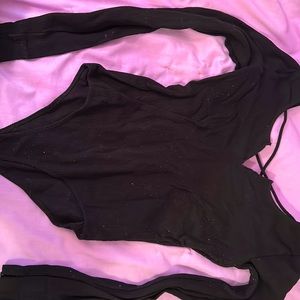 Black ribbed long sleeve body suit, open back